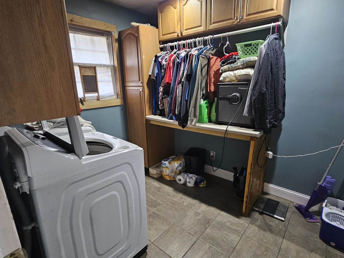686 Airport Road Metropolis, IL 62960 - Photo 14 of 19 a view of walk in closet with clothes and shoes