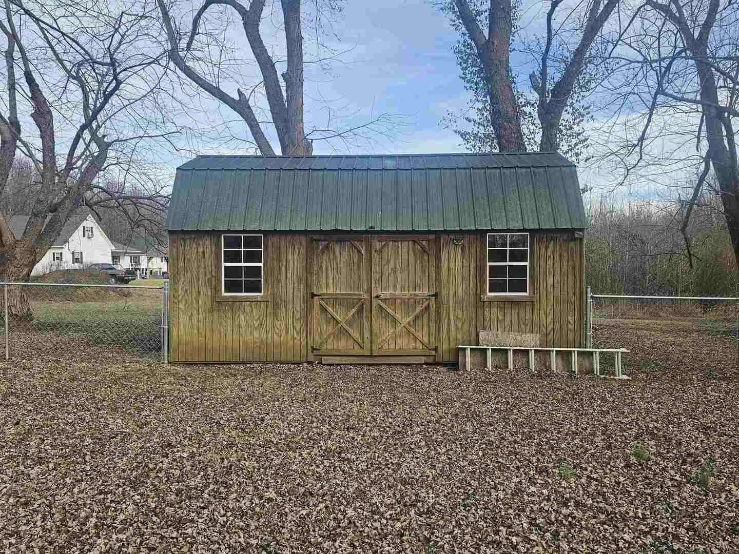 686 Airport Road Metropolis, IL 62960 - Photo 19 of 19 a view of a house with a yard