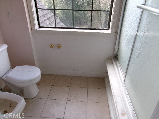 17392 Cache Creek Road Clearlake Oaks, CA 95423 - Photo 15 of 25 a bathroom with a toilet