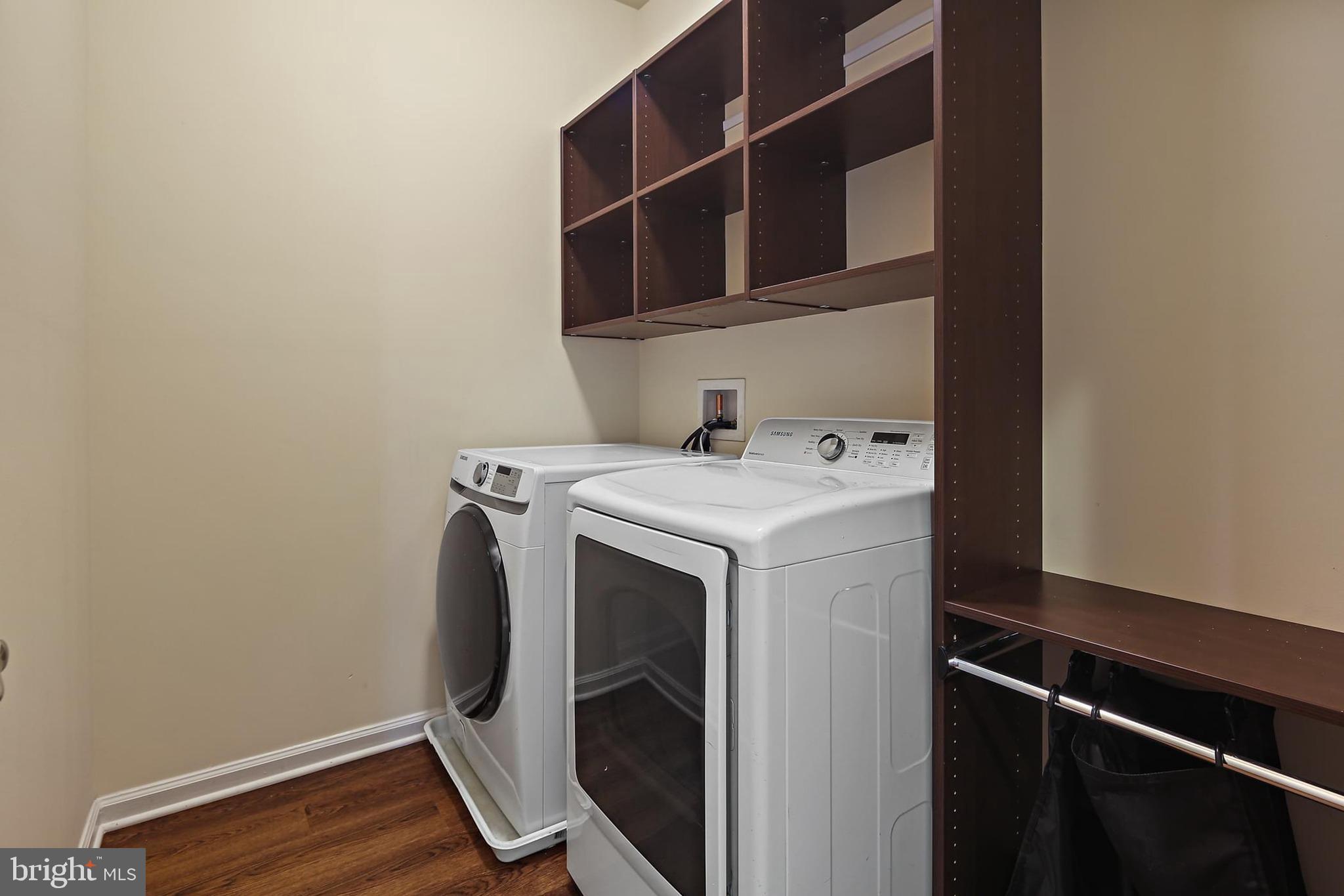 11675 Emerald Green Drive Clarksburg, MD 20871 - Photo 20 of 35 a utility room with dryer and washer