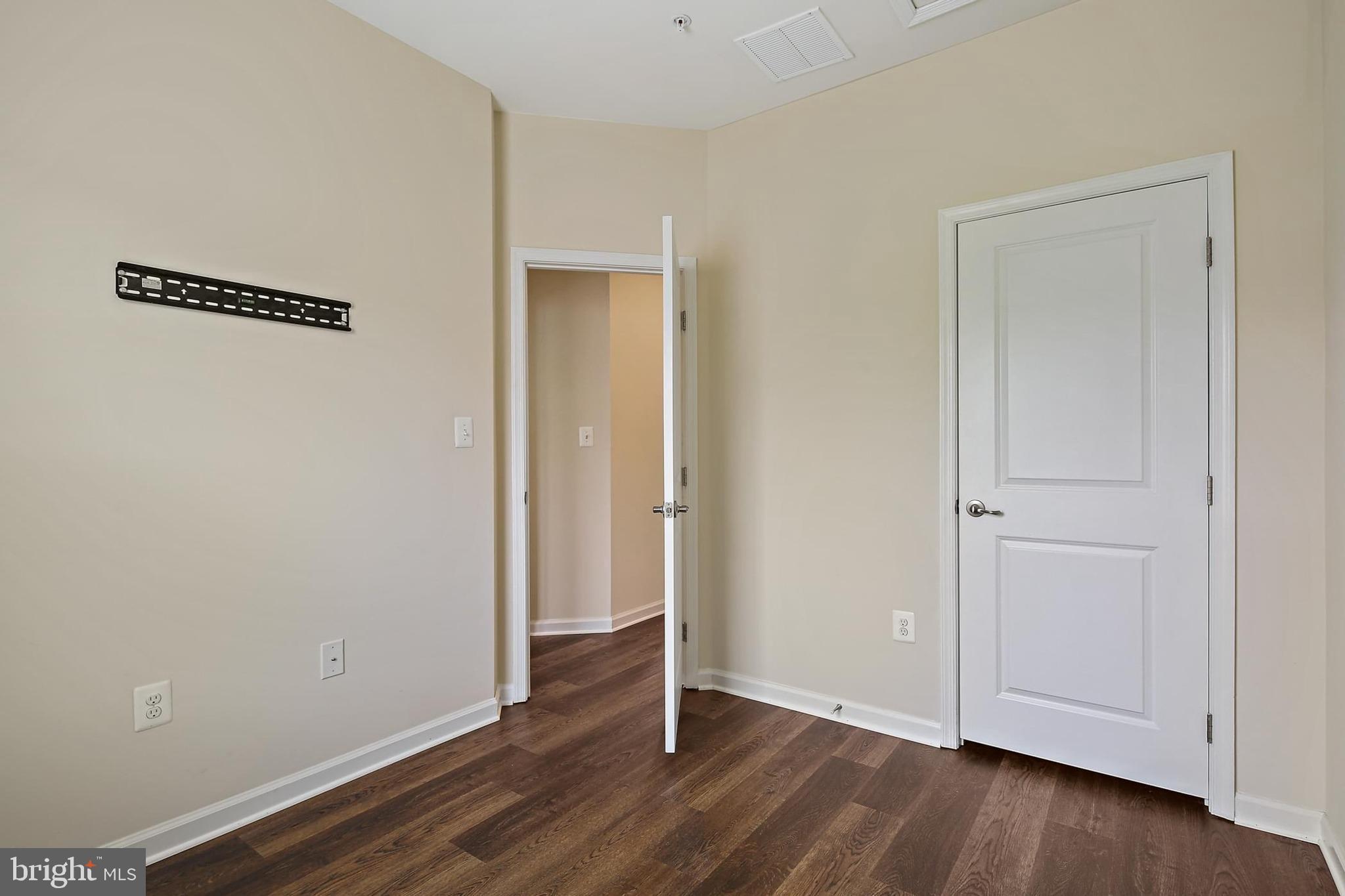 11675 Emerald Green Drive Clarksburg, MD 20871 - Photo 25 of 35 a view of a room with wooden floor