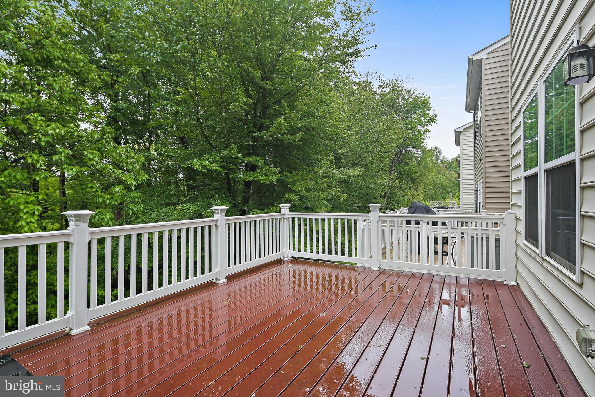 11675 Emerald Green Drive Clarksburg, MD 20871 - Photo 26 of 35 a view of balcony with wooden floor and fence