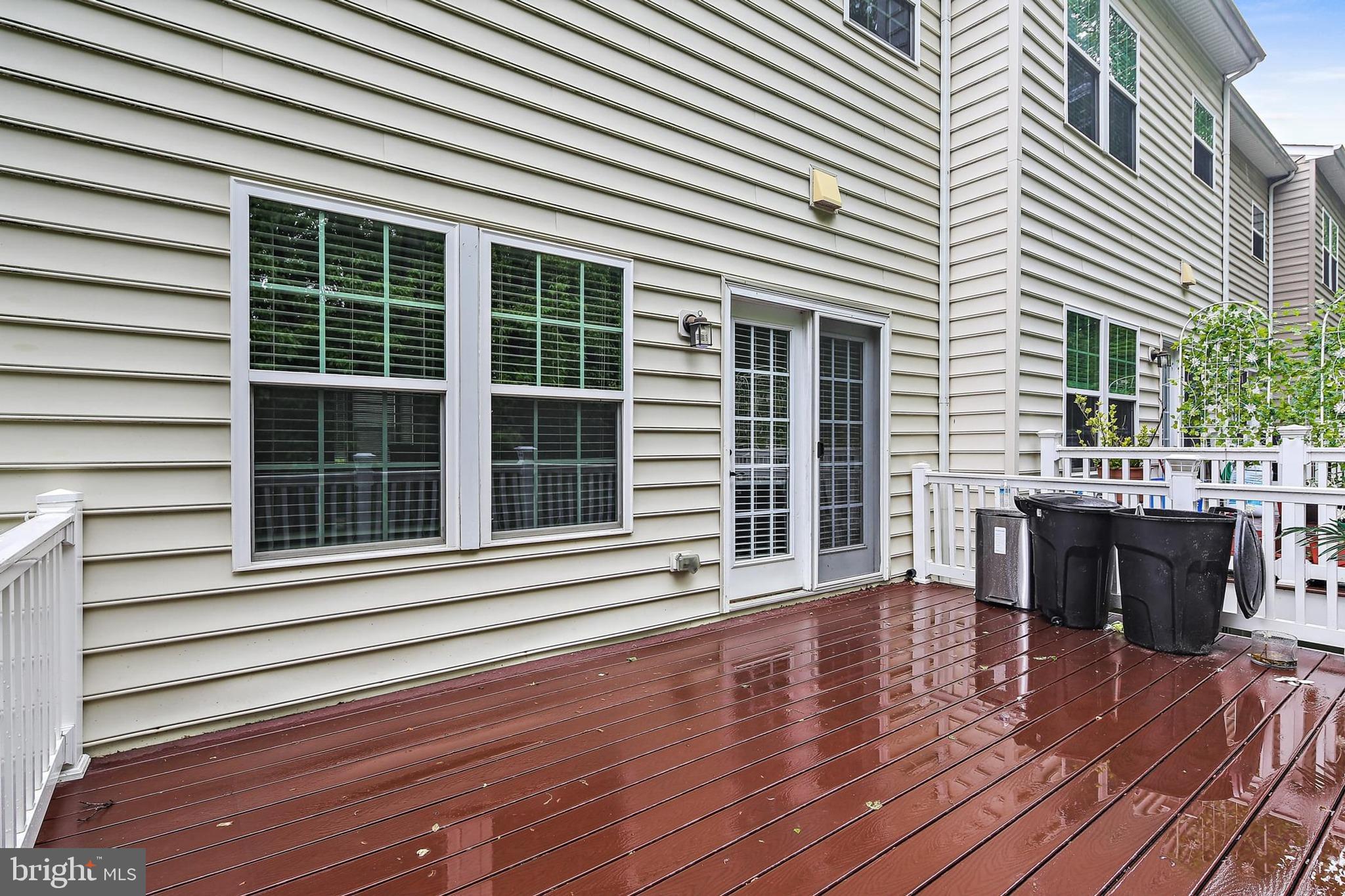 11675 Emerald Green Drive Clarksburg, MD 20871 - Photo 27 of 35 a view of a house with backyard and wooden floor