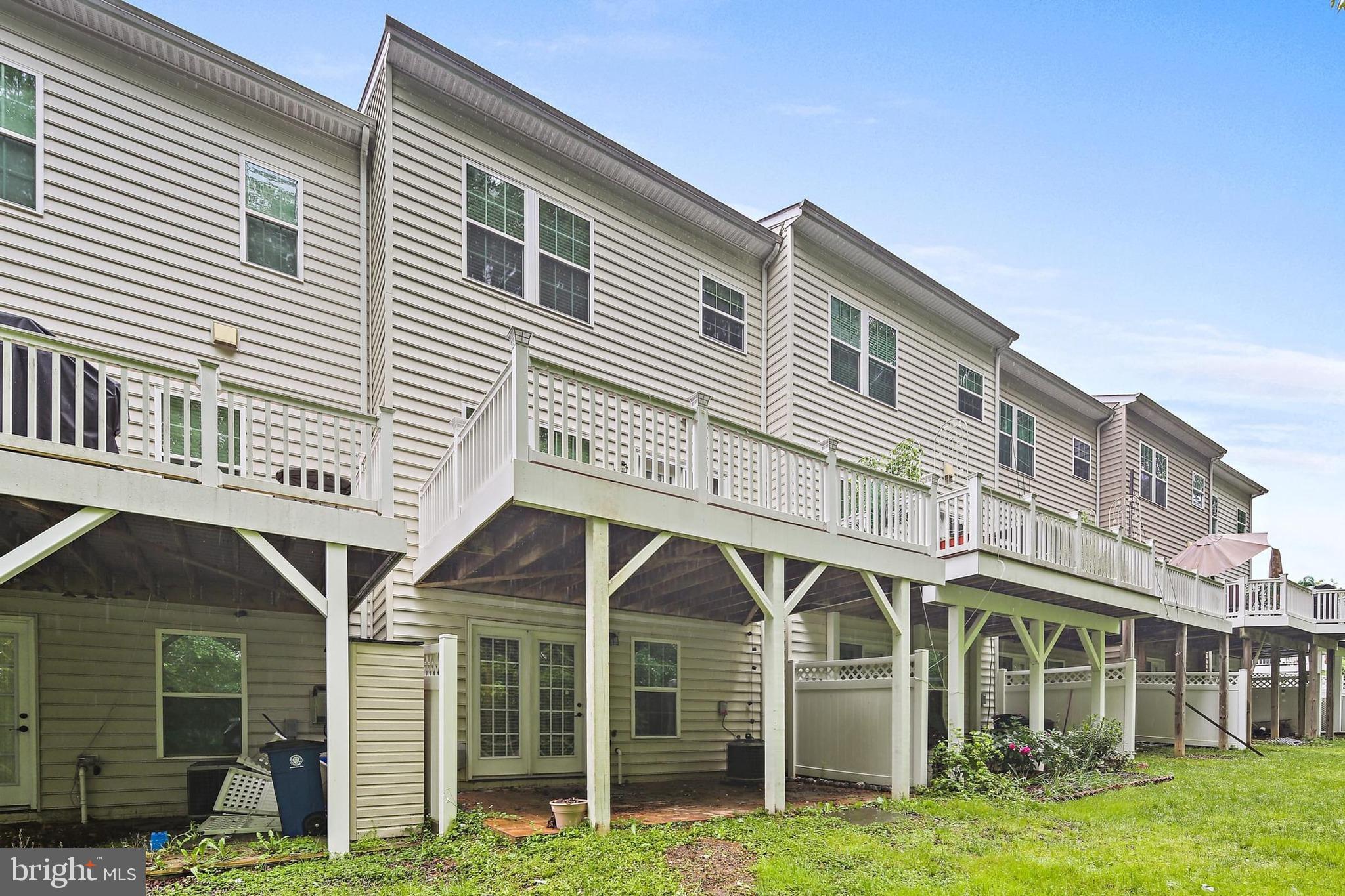11675 Emerald Green Drive Clarksburg, MD 20871 - Photo 29 of 35 a front view of a house with a yard