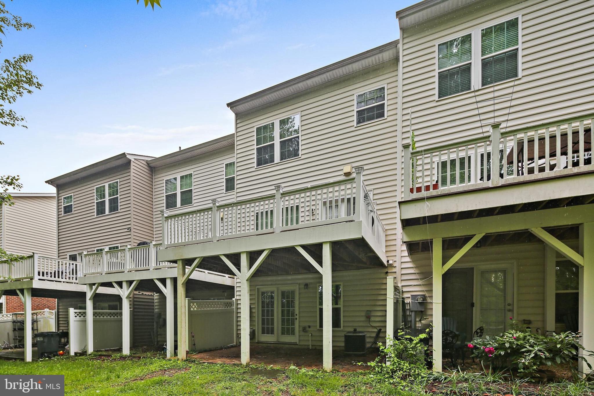 11675 Emerald Green Drive Clarksburg, MD 20871 - Photo 31 of 35 a front view of a house with a yard