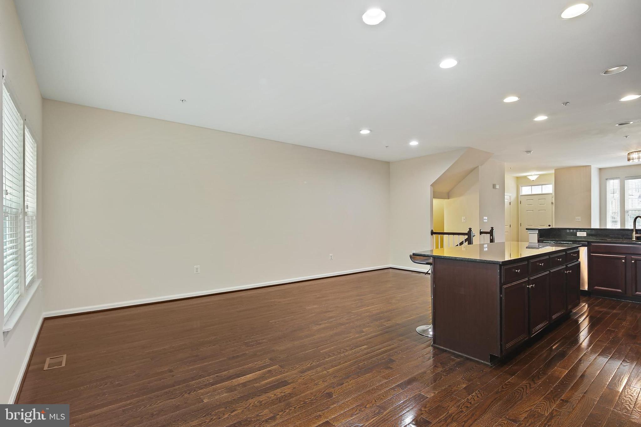11675 Emerald Green Drive Clarksburg, MD 20871 - Photo 5 of 35 a view of kitchen with wooden floor