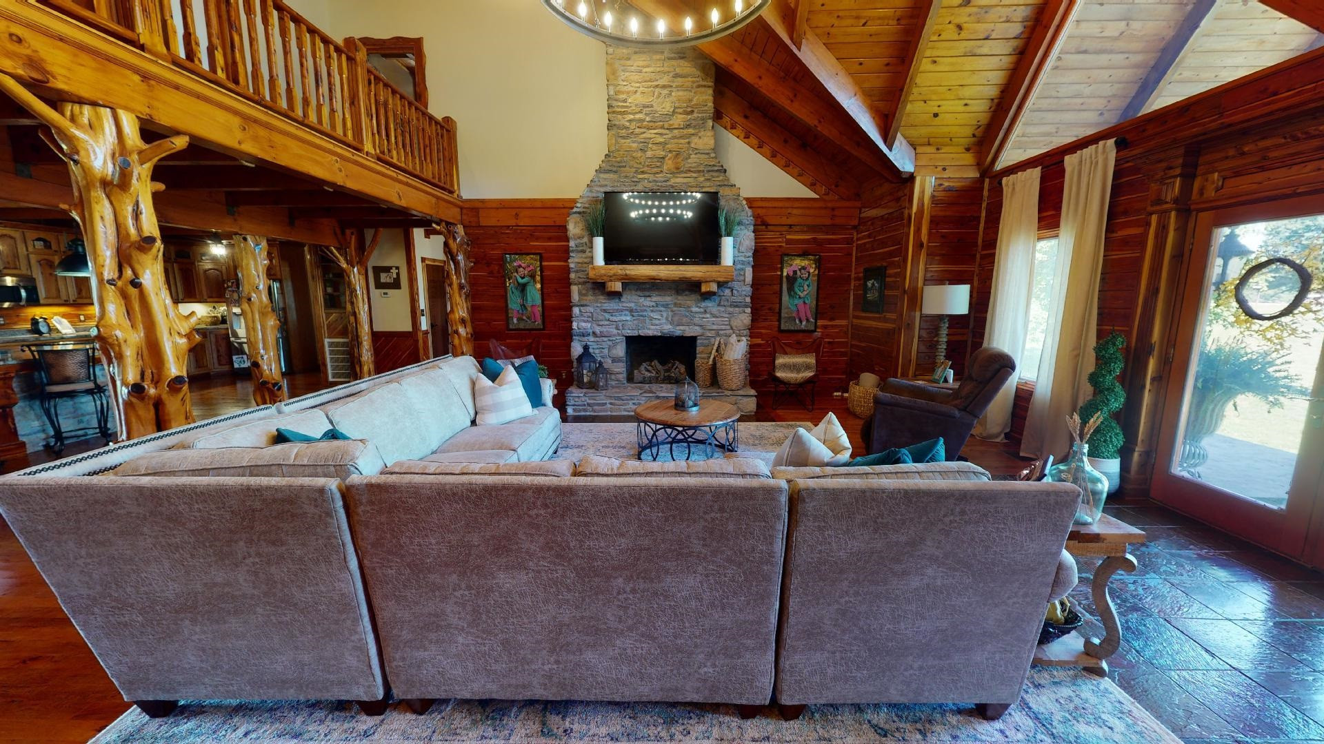 1390 Butler Road Newbern, TN 38059 - Photo 6 of 43 a living room with furniture a fireplace and a large window