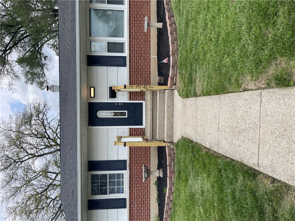1361 Sussex Road Troy, OH 45373 - Photo 11 of 25 This charming home welcomes you with a classic exterior and lush landscaping.