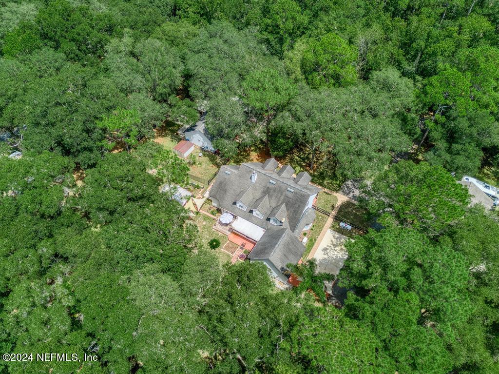 8225 Hardwood Landing Road St. Augustine, FL 32092 - Photo 120 of 126 an aerial view of residential house with outdoor space and trees all around