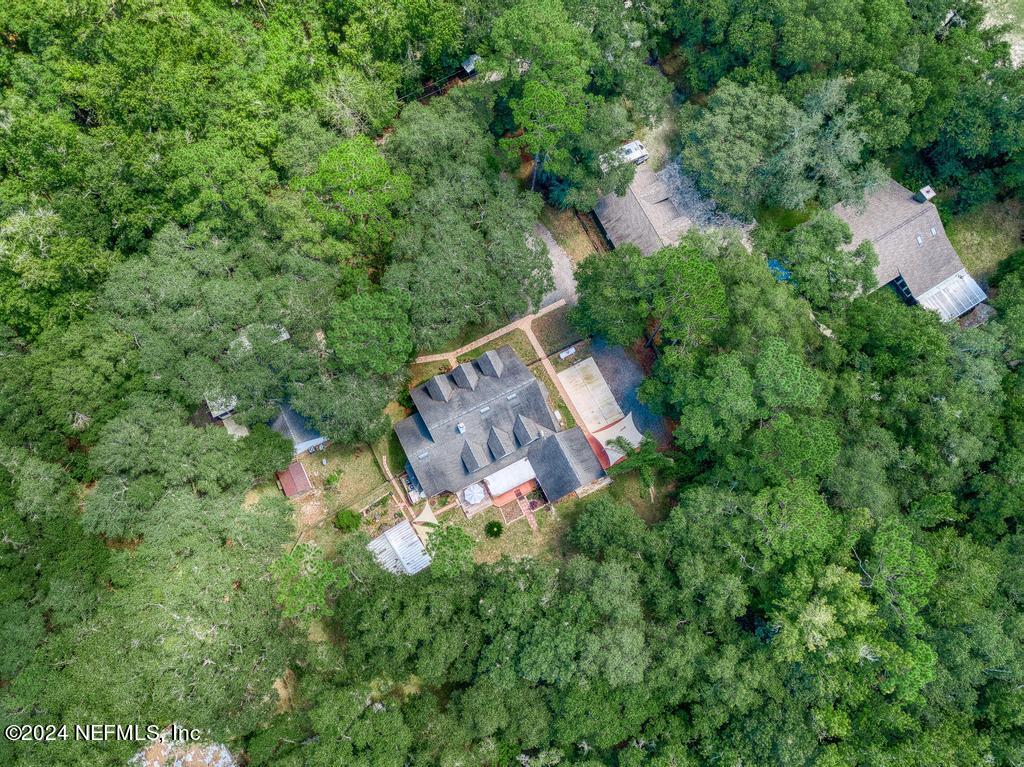 8225 Hardwood Landing Road St. Augustine, FL 32092 - Photo 121 of 126 an aerial view of a house with a yard basket ball court and outdoor seating