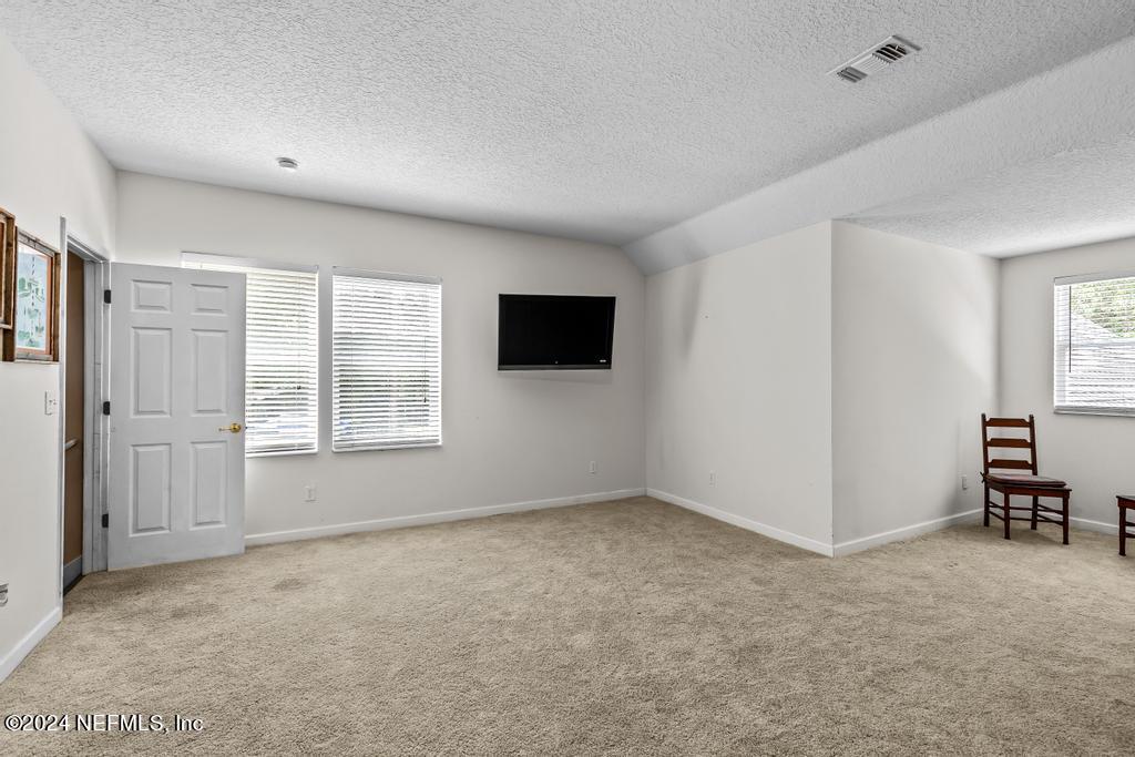 8225 Hardwood Landing Road St. Augustine, FL 32092 - Photo 36 of 126 a view of an empty room with a window