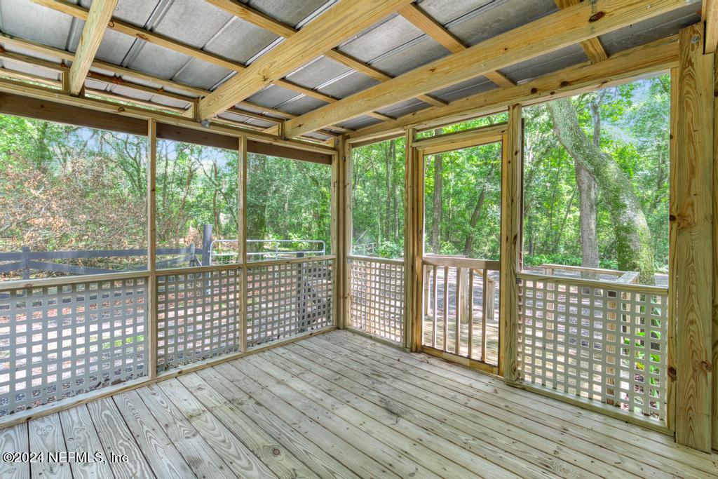 8225 Hardwood Landing Road St. Augustine, FL 32092 - Photo 92 of 126 a view of a balcony with wooden floor