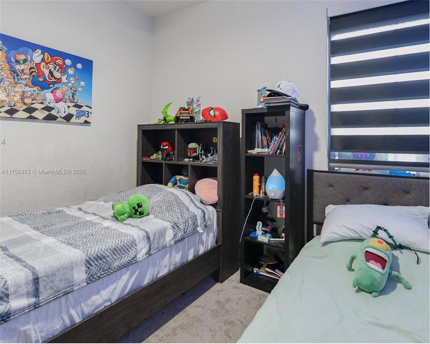 11426 West 33rd Way Hialeah, FL 33018 - Photo 11 of 14 a bedroom with bed and a window