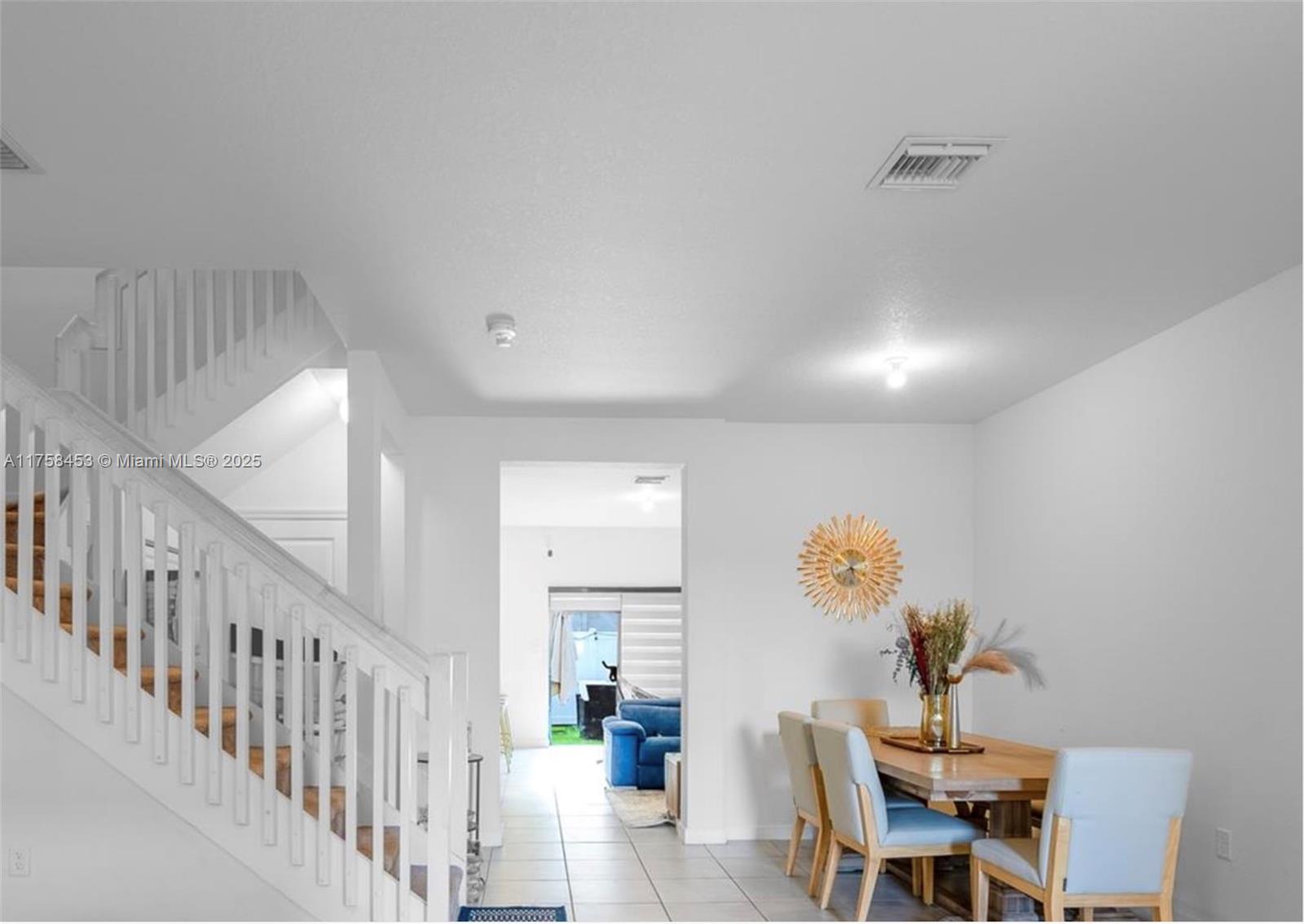 11426 West 33rd Way Hialeah, FL 33018 - Photo 7 of 14 a living room with furniture