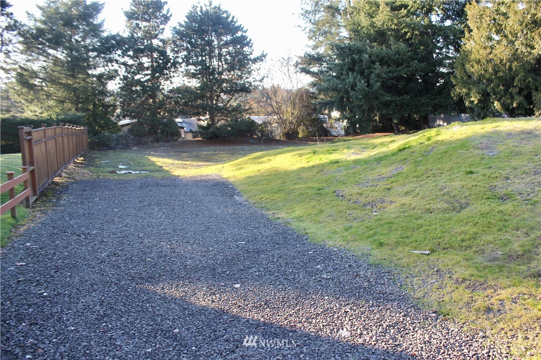 0 7th Place West Bothell, WA 98021 - Photo 2 of 12 a view of a yard with swimming pool