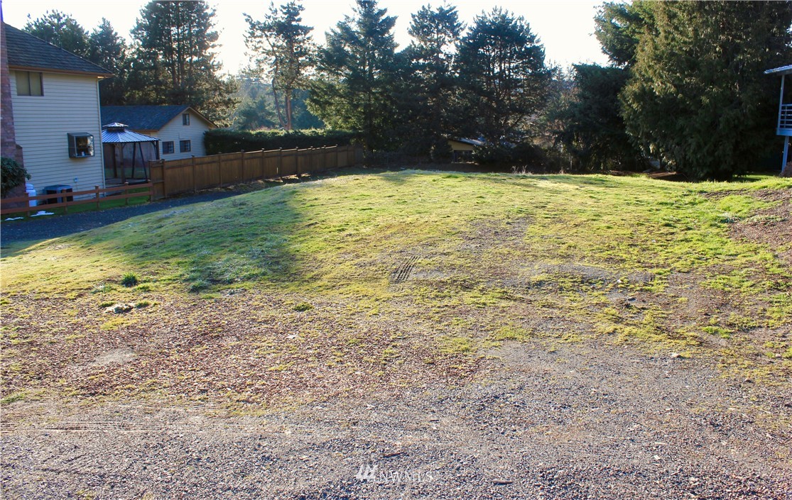 0 7th Place West Bothell, WA 98021 - Photo 12 of 12 a view of a yard with a house