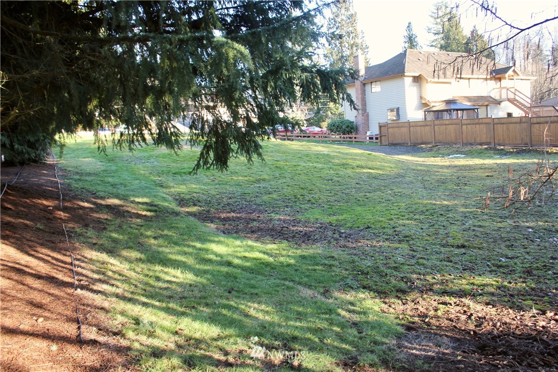 0 7th Place West Bothell, WA 98021 - Photo 7 of 12 a view of a park with large trees