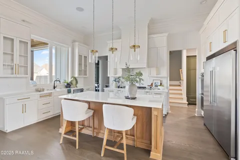 $872,000 | 202 Sabal Grv Lane, Youngsville, LA 70592