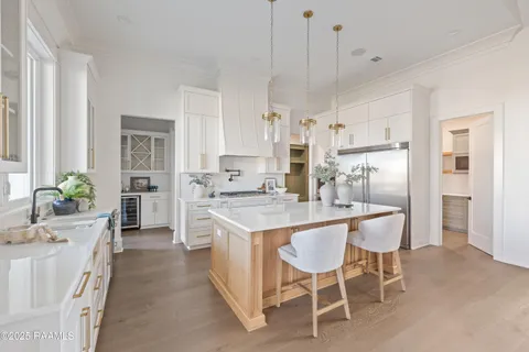 $872,000 | 202 Sabal Grv Lane, Youngsville, LA 70592