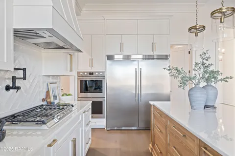 $872,000 | 202 Sabal Grv Lane, Youngsville, LA 70592