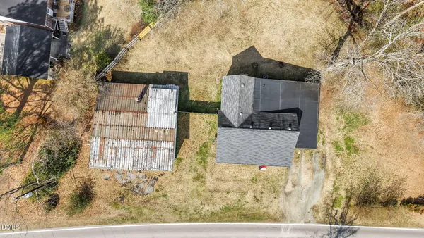 an aerial view of residential house with outdoor space