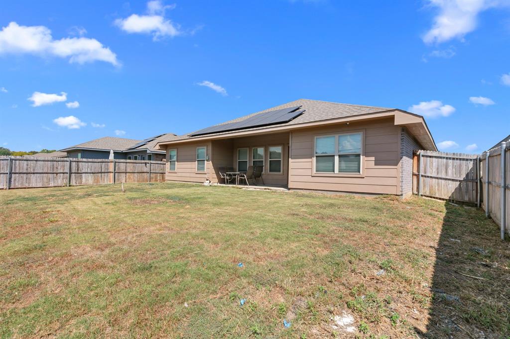 14580 Gully Place Dallas, TX 75253 - Photo 29 of 30 a view of a house with a backyard