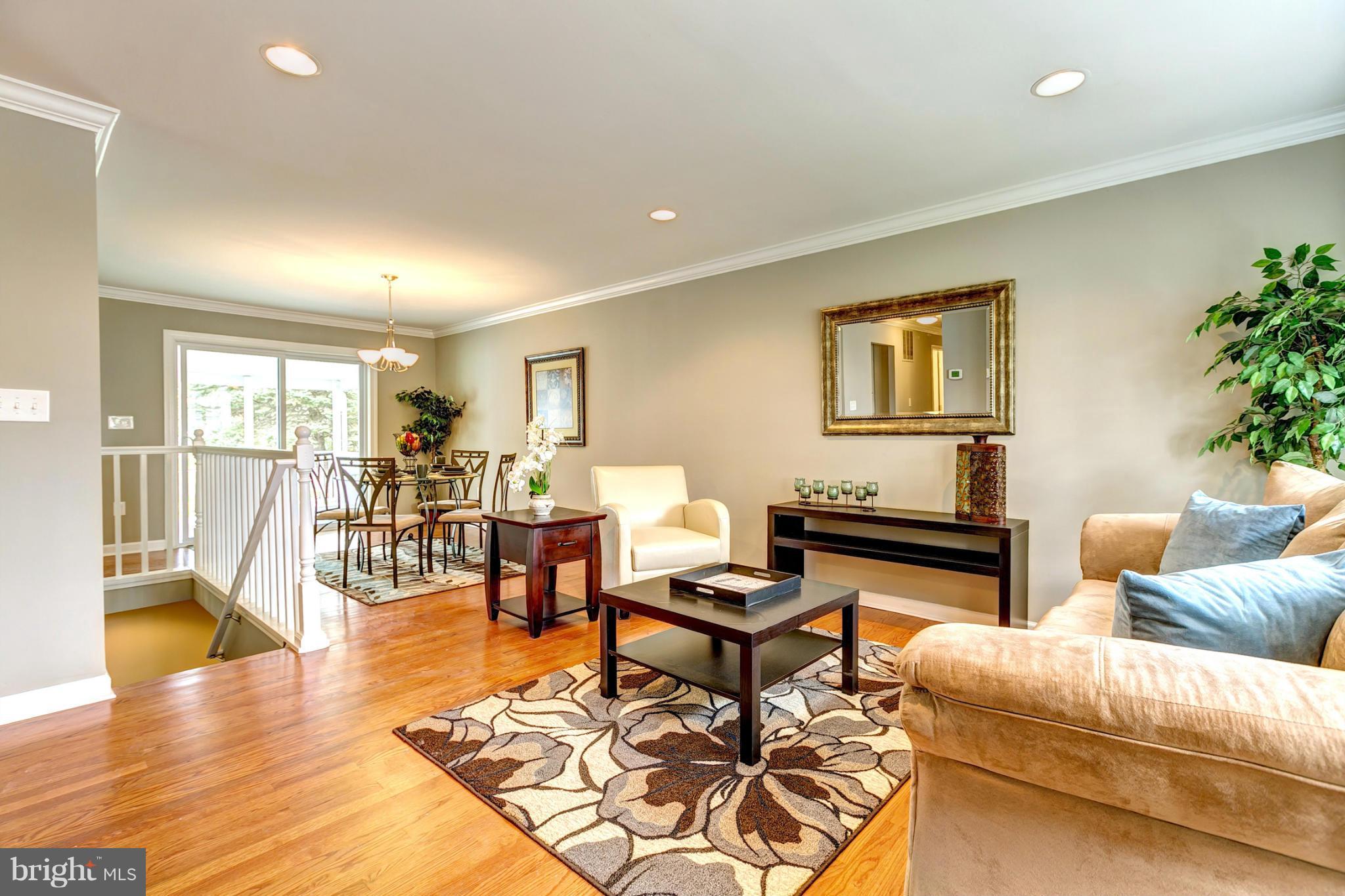 3902 Susanna Road Randallstown, MD 21133 - Photo 1 of 29 a living room with furniture and a table