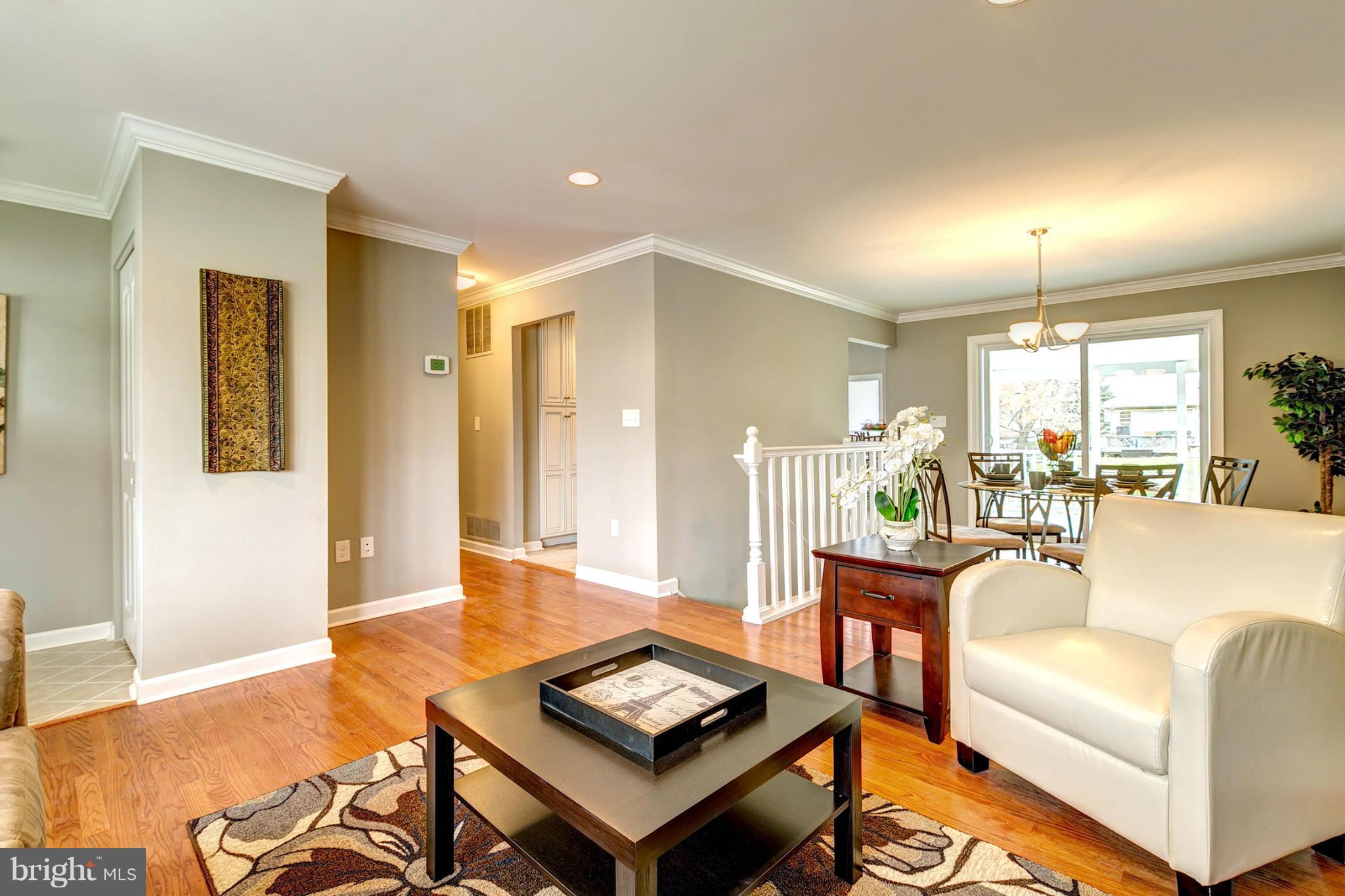 3902 Susanna Road Randallstown, MD 21133 - Photo 3 of 29 a living room with furniture and a wooden floor