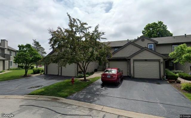 a car parked in front of a house