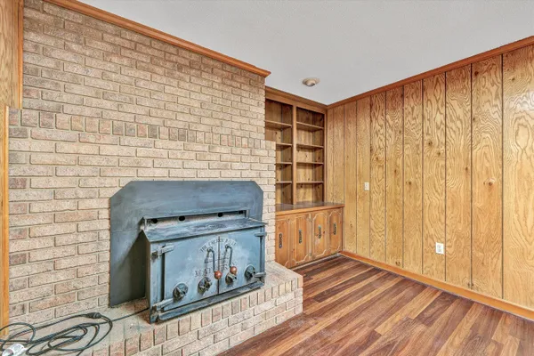 a swimming pool with outdoor seating and yard