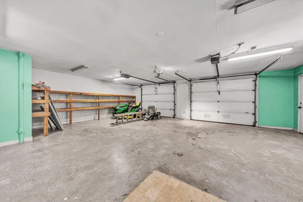 a view of a dry yard with green space