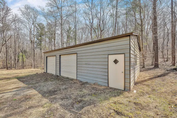 a view of outdoor space with chairs