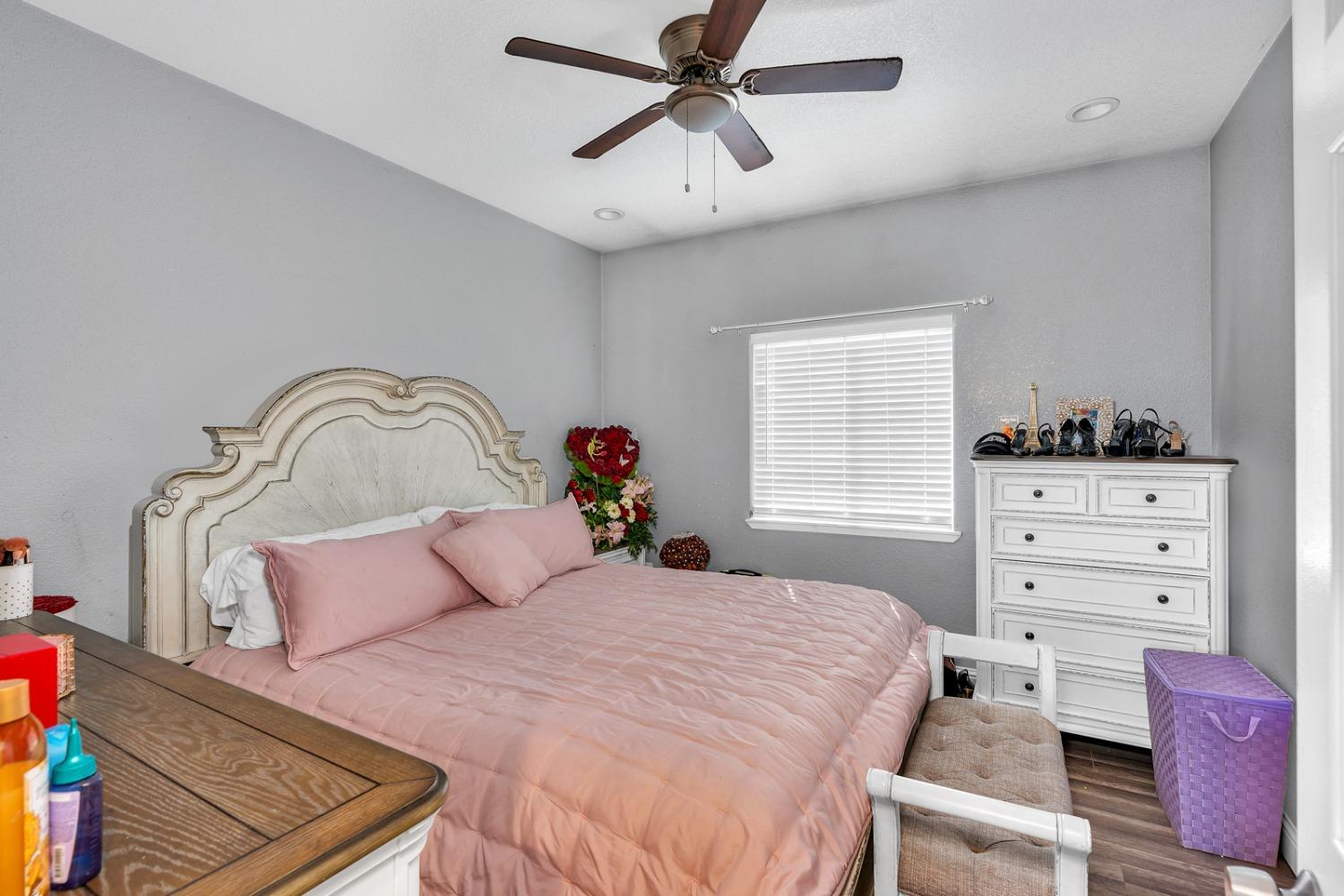 509 Kerr Avenue Modesto, CA 95354 - Photo 29 of 55 a bedroom with a bed and a dresser