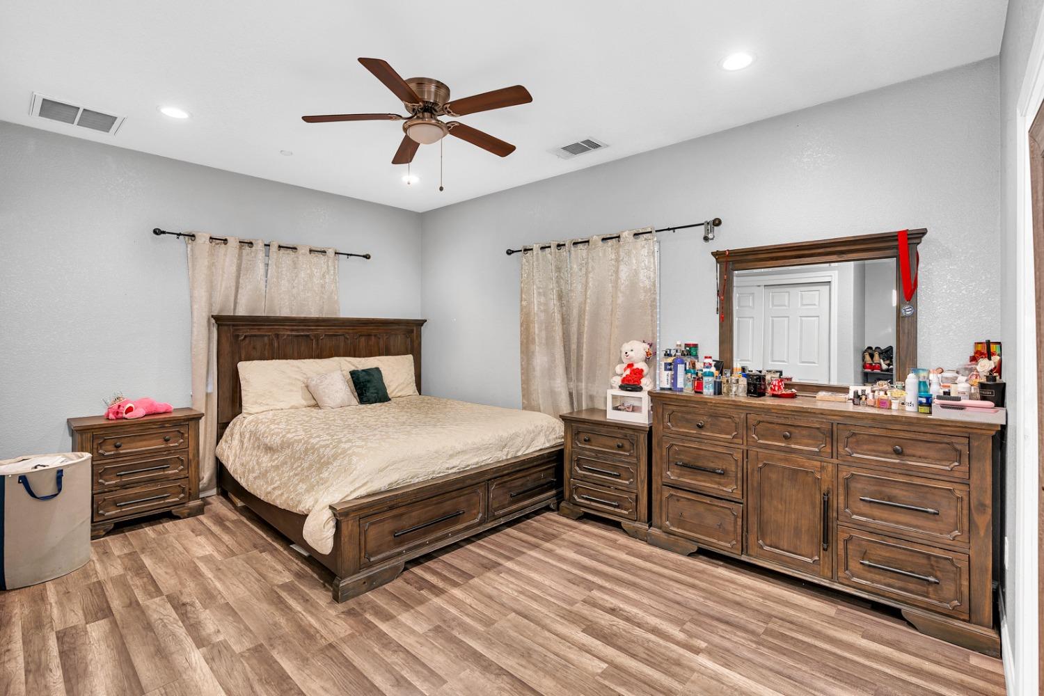 509 Kerr Avenue Modesto, CA 95354 - Photo 31 of 55 a bedroom with a bed and a dresser