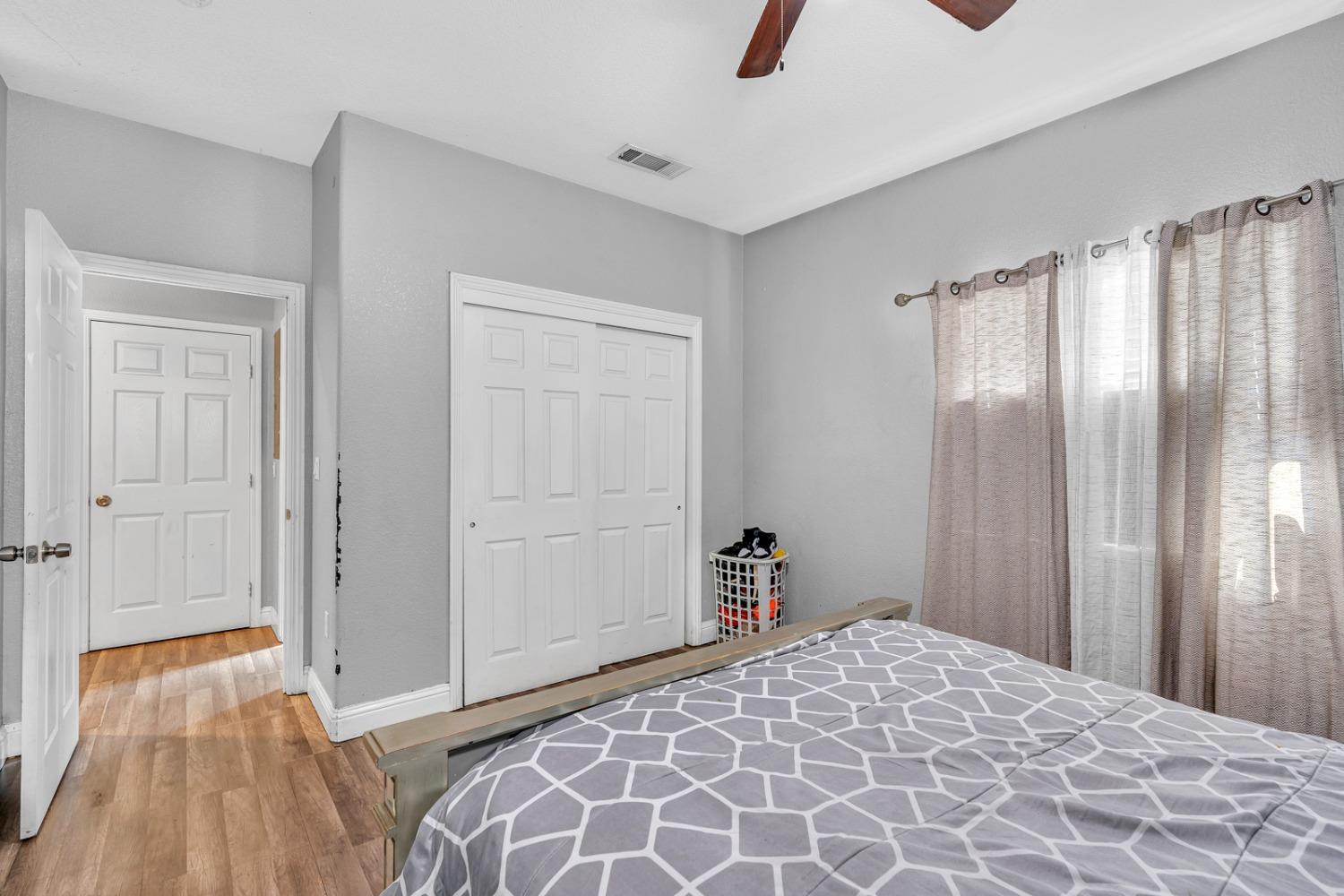 509 Kerr Avenue Modesto, CA 95354 - Photo 40 of 55 a bedroom with a bed and a dresser