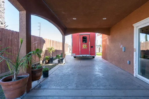 a view of front door with outdoor seating