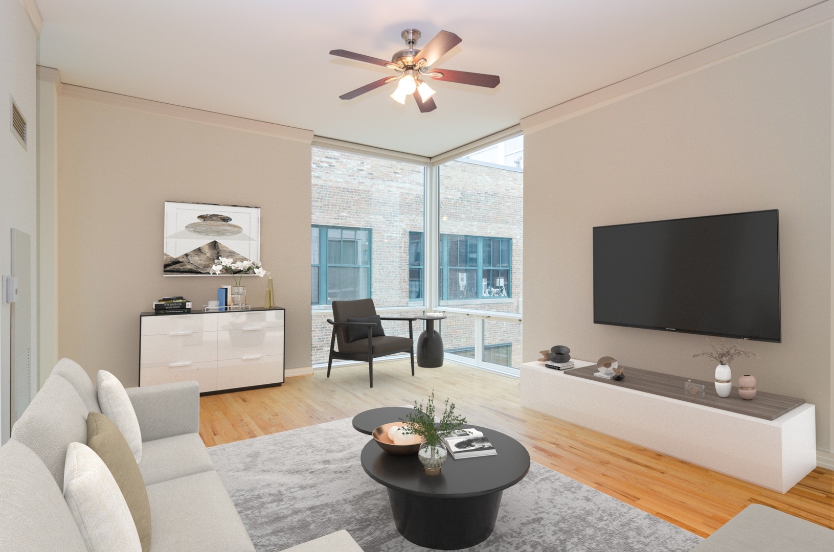 170 West Polk Street, Unit 906 Chicago, IL 60605 - Photo 5 of 18 a living room with furniture and a flat screen tv