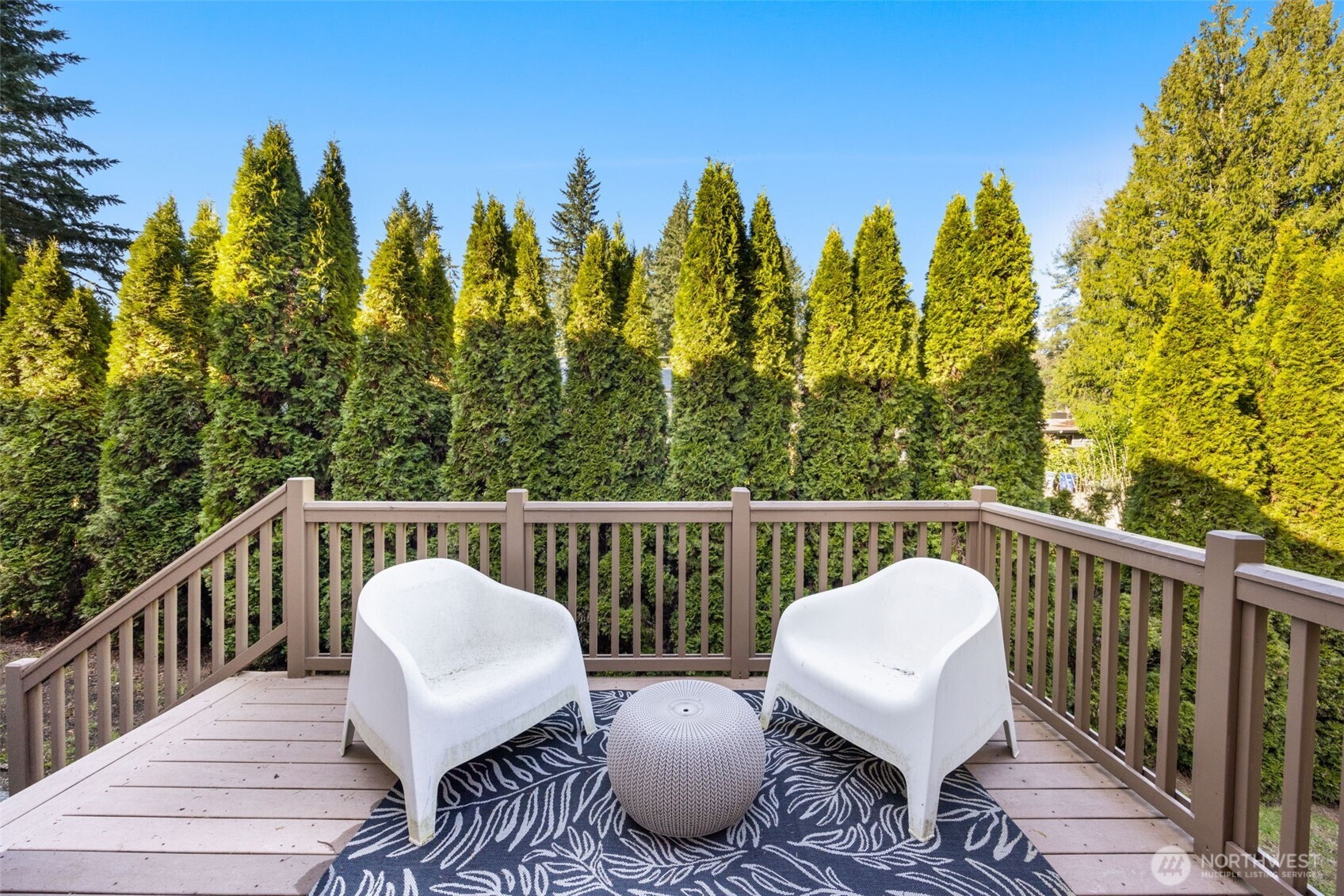 18638 92nd Avenue Northeast Bothell, WA 98011 - Photo 7 of 40 a view of a balcony with wooden floor and outdoor seating