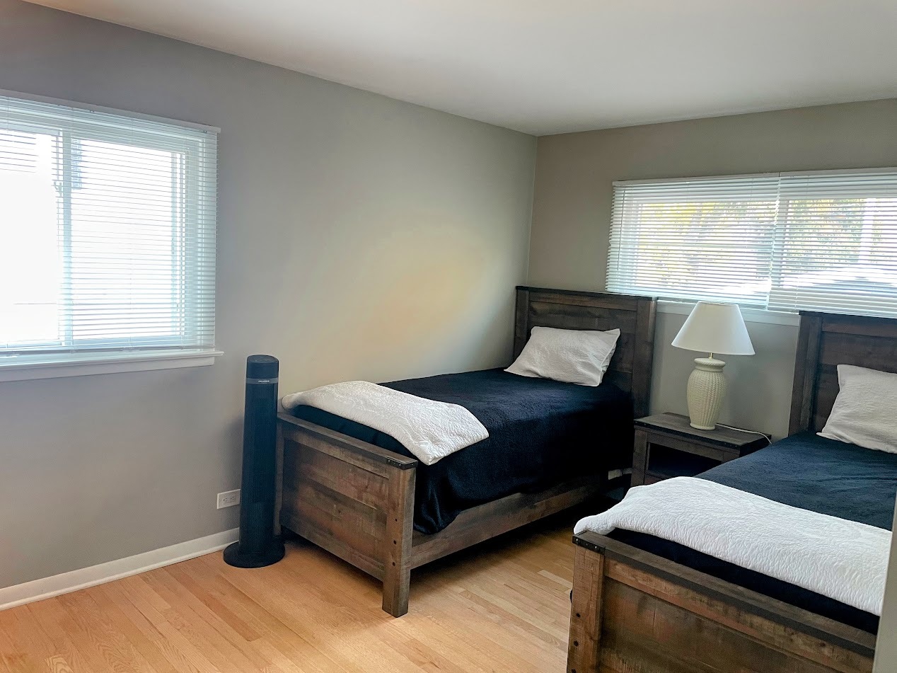 543 South 7th Street West Dundee, IL 60118 - Photo 10 of 12 a bedroom with a bed and window