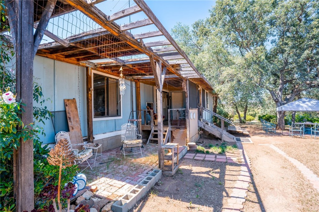 17939 Lyons Valley Road Jamul, CA 91935 - Photo 14 of 35 a view of the chairs and table in the patio