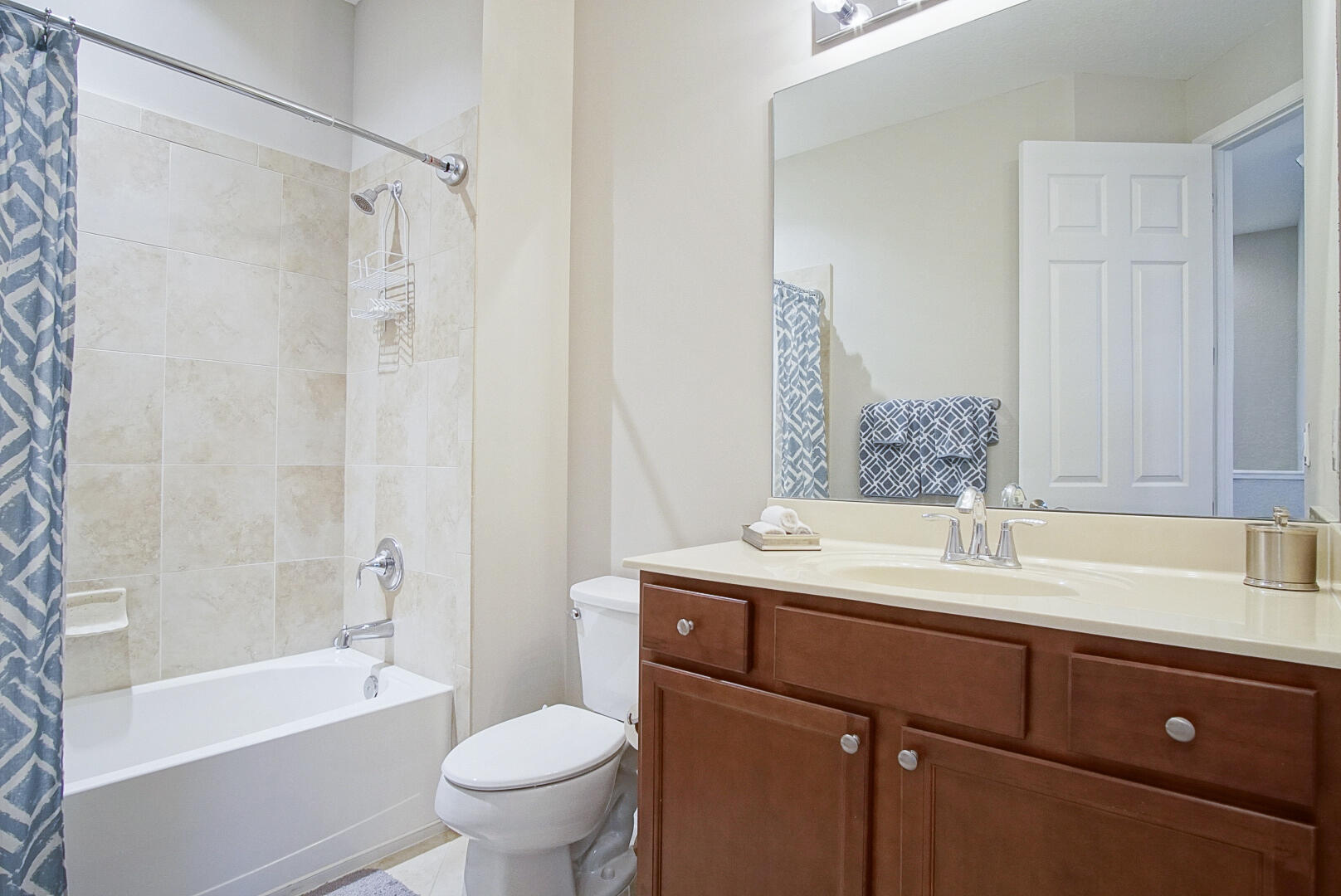 638 Southwest Glen Crest Way Stuart, FL 34997 - Photo 23 of 32 a bathroom with a sink toilet and shower