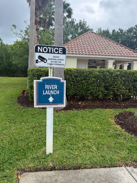 638 Southwest Glen Crest Way Stuart, FL 34997 - Photo 26 of 32 a sign on the side of the house