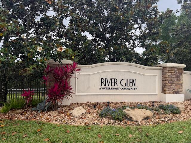 638 Southwest Glen Crest Way Stuart, FL 34997 - Photo 29 of 32 a sign that is on a brick wall