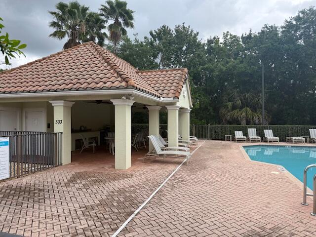 638 Southwest Glen Crest Way Stuart, FL 34997 - Photo 30 of 32 a house view with a outdoor space