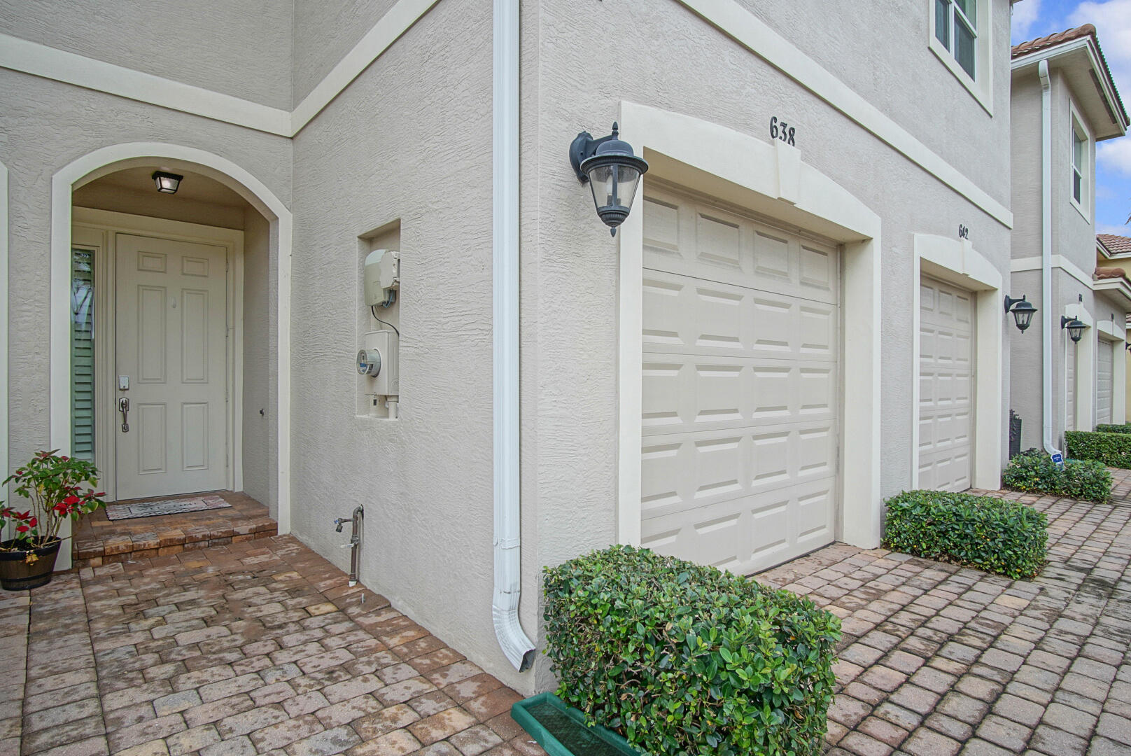 638 Southwest Glen Crest Way Stuart, FL 34997 - Photo 3 of 32 a view of a front door and a window