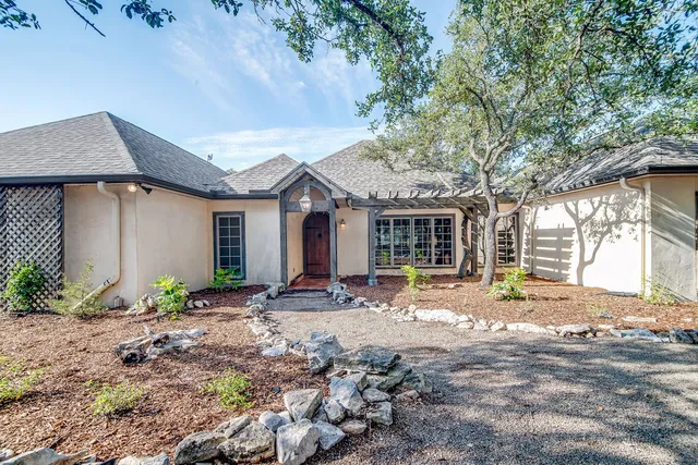 a view of a yard with an outdoor space