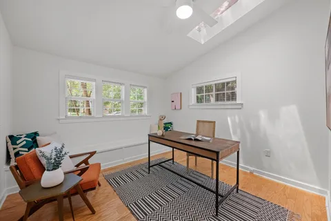 a room with furniture and a window