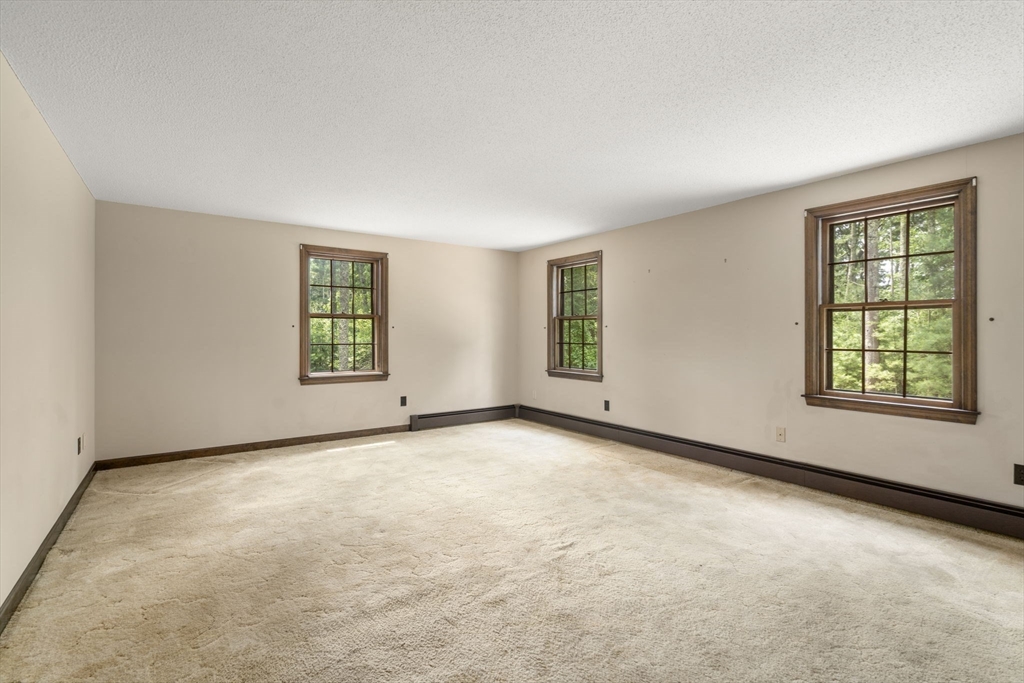 9 Randall Road Rochester, MA 02770 - Photo 24 of 42 an empty room with windows