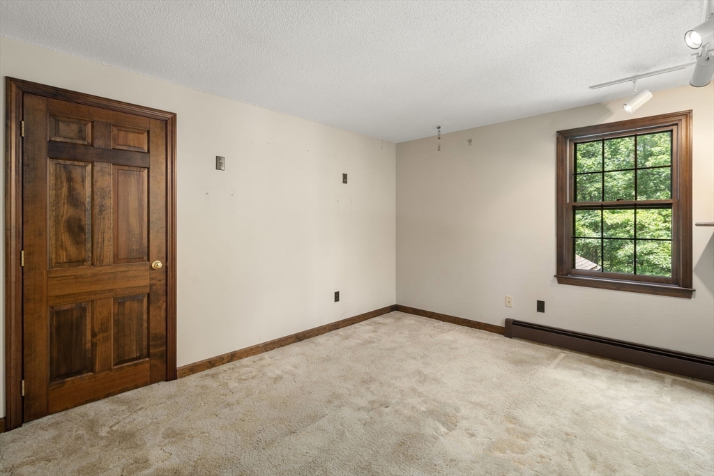 9 Randall Road Rochester, MA 02770 - Photo 33 of 42 a view of an empty room with window