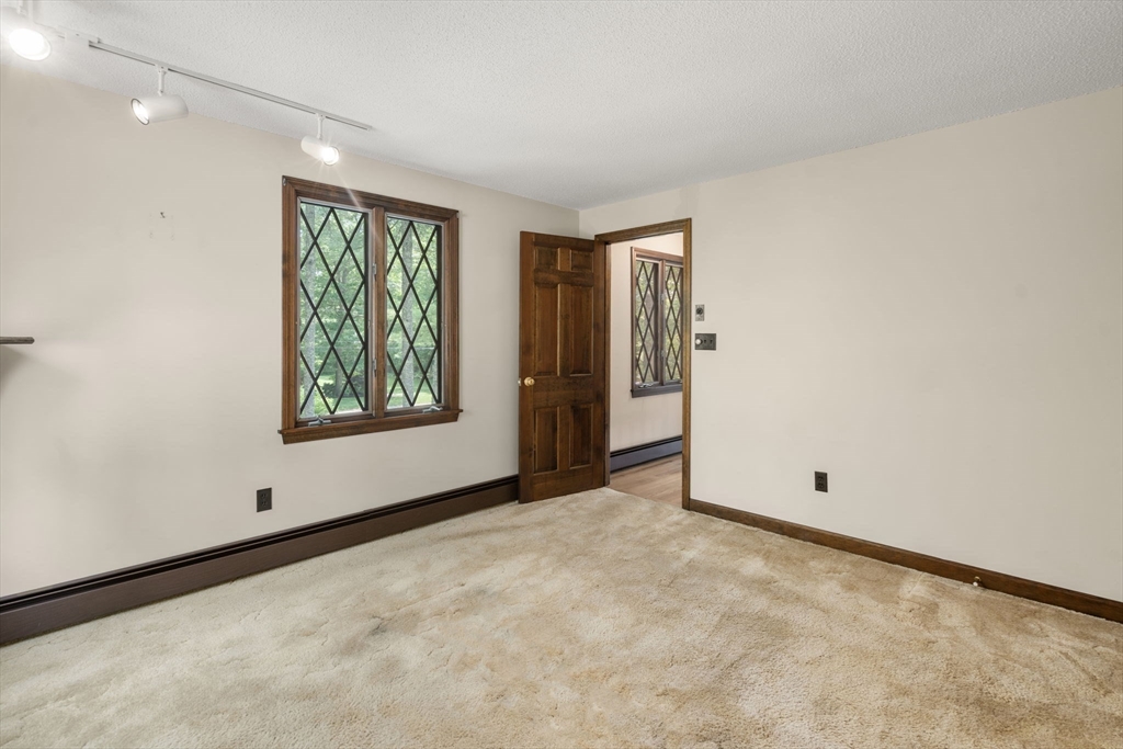 9 Randall Road Rochester, MA 02770 - Photo 34 of 42 a view of an empty room with a window